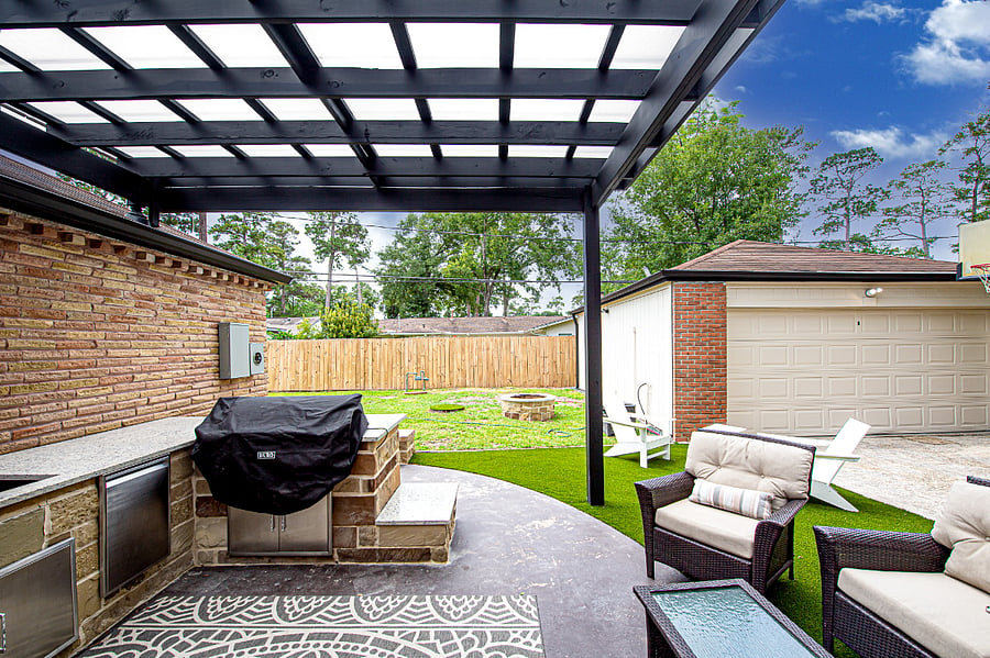 View from inside the house to outdoor kitchen
