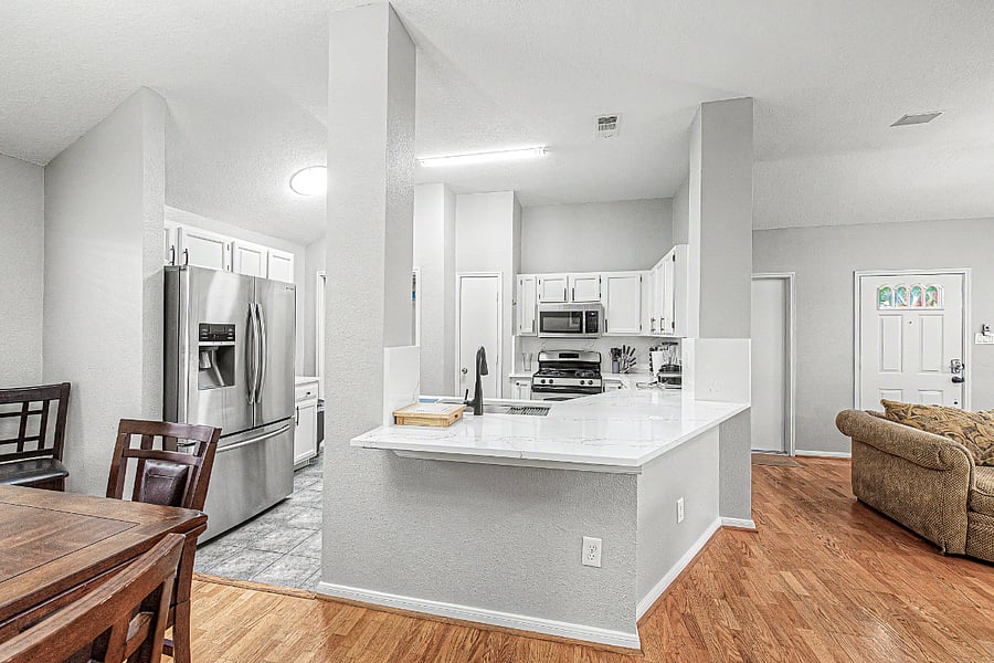 New open concept kitchen with a large peninsula 