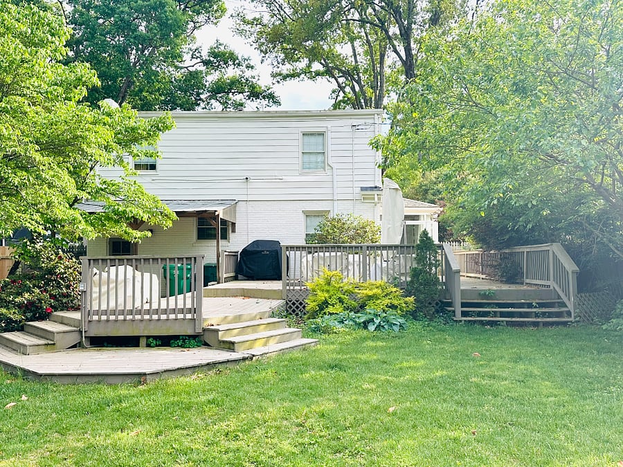Multi-tiered deck w/ patio furniture and firepit; perfect for entertaining.