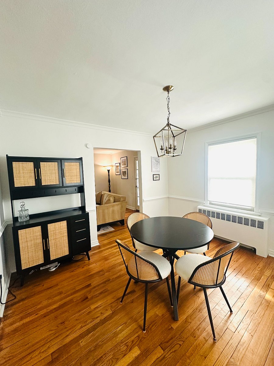 Dining room w/ hutch; great for storage.