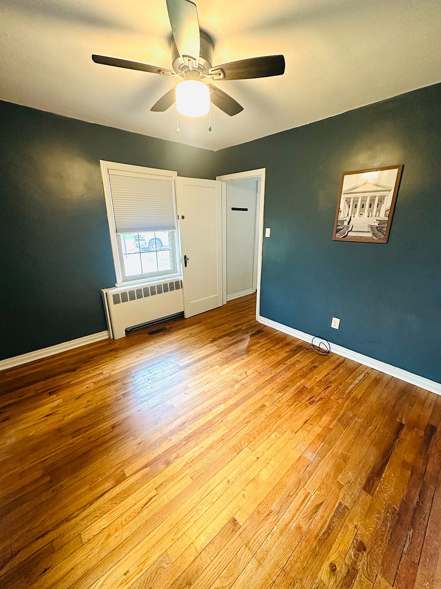 Downstairs flex room w/ half bath. Can be furnished into a bedroom or office space at no cost to tenant.