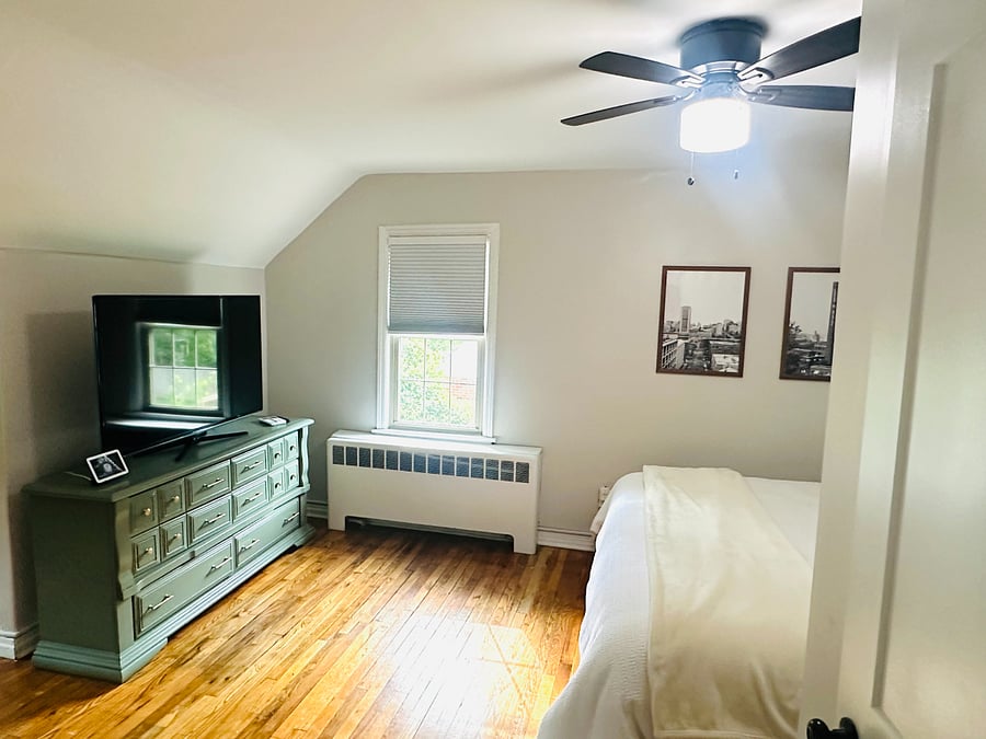 Upstairs Master Bedroom w/ 55 inch smart TV.