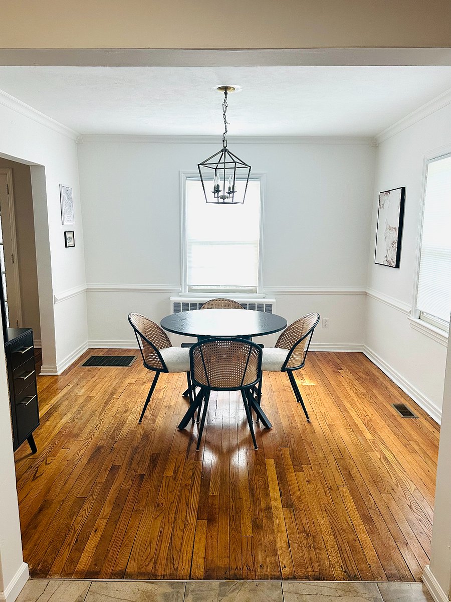 Dining room w/ hutch; great for storage.
