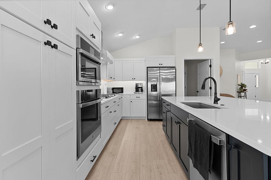 Built in Microwave and Oven Cabinets, Air Fryer, Coffee Pot/Kpod combo, water and ice in fridge door.