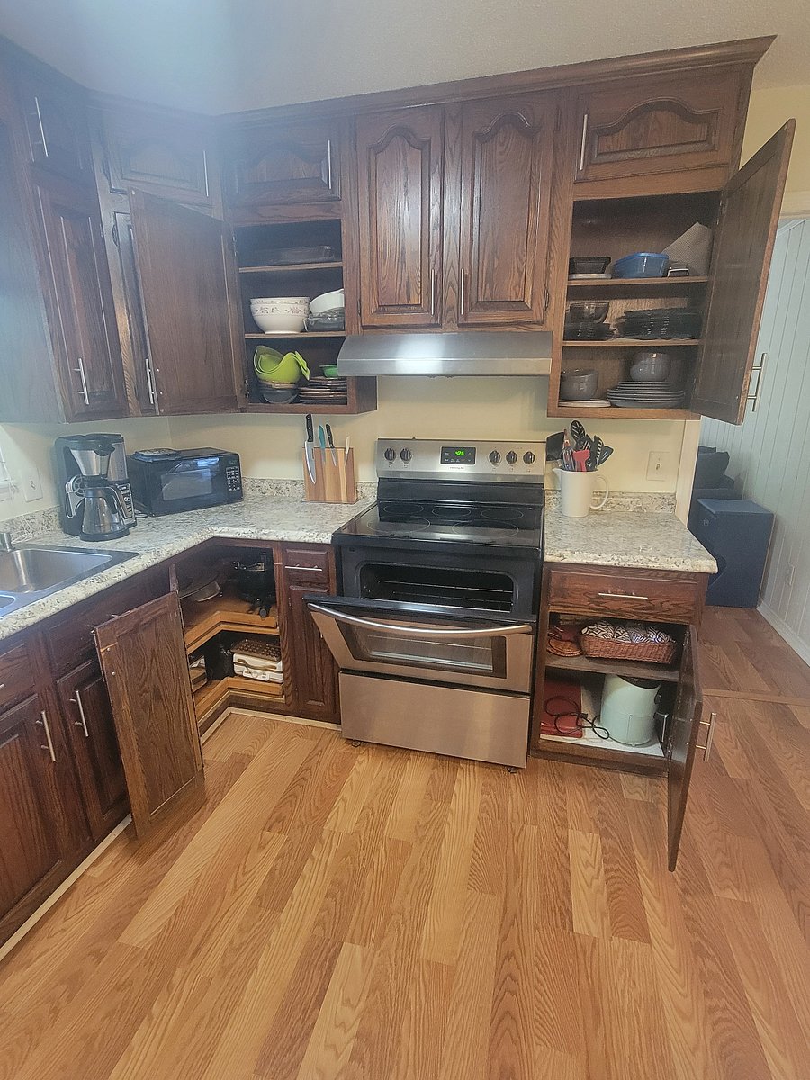 fully stocked kitchen with dishwasher