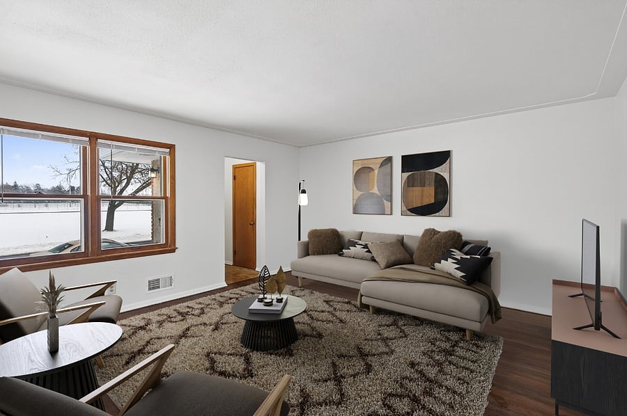 Living area featuring comfy seating, a smart tv, and dedicated work space with fast wifi! (Furniture recently updated to more pet-friendly!)