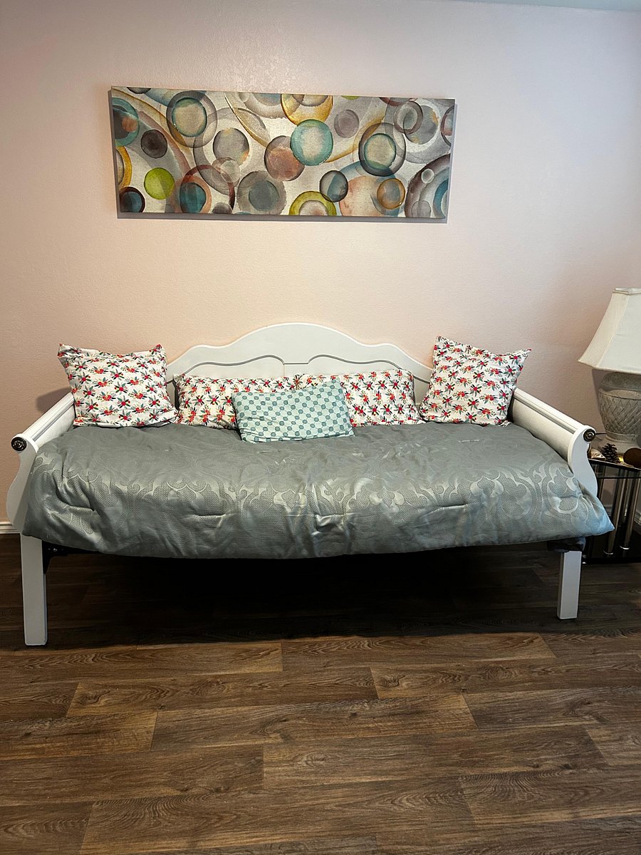 Day bed in the first level, room can be used as a fifth room or as an office space.