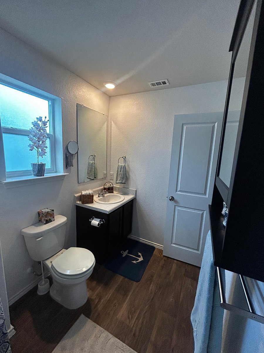 Second bathroom upstairs with additional towels. Shampoo, body soap and conditioner included.