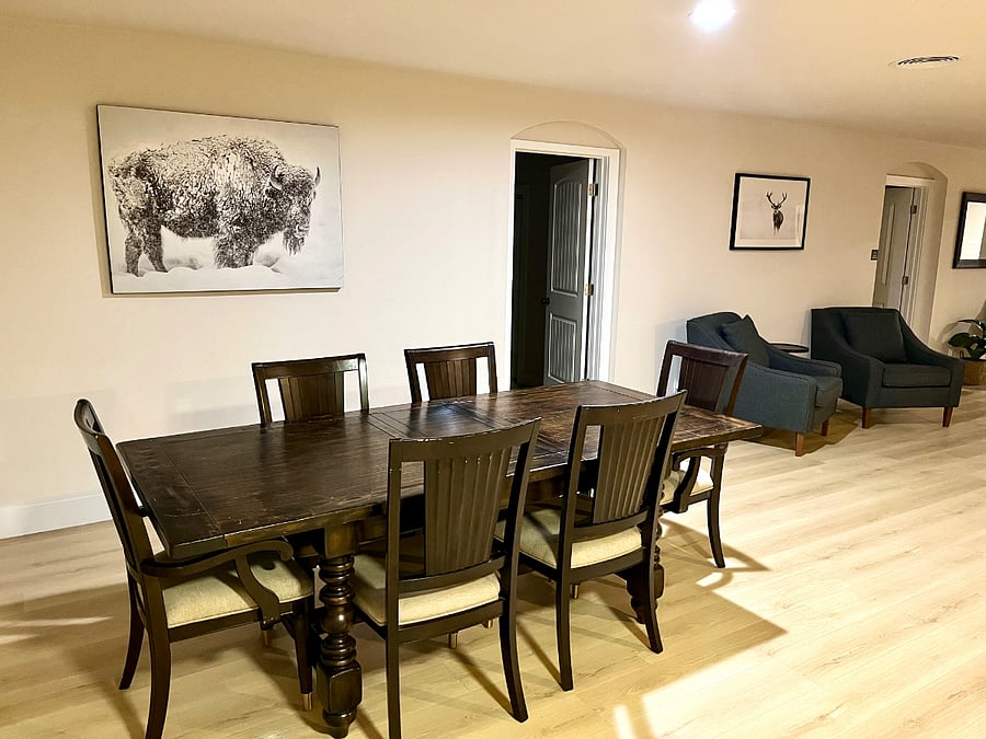 Dining table with extra leaf on-site for larger groups