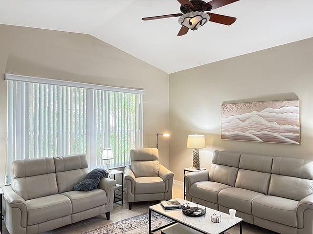 Main living room with smart TV off of kitchen and main bedroom