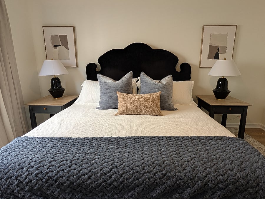 Primary bedroom main floor with king bed