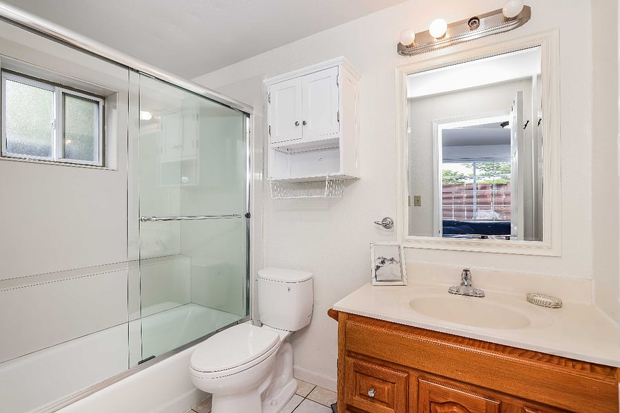 Full bath with new bathroom, enclosure and new sliding glass shower door, new Toto quiet toilet.