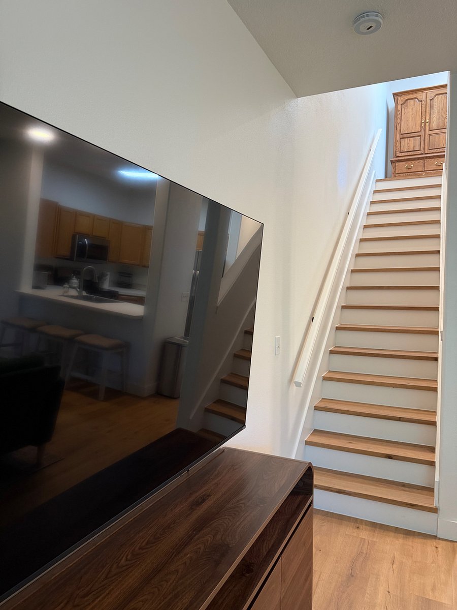 Stairs to 2nd floor with in-unit laundry and bedrooms