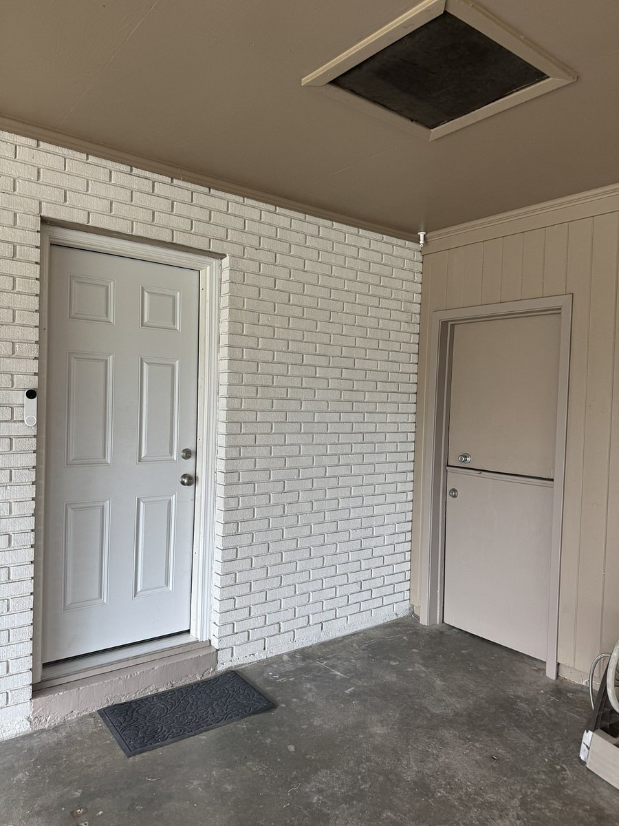 Carport entrance to kitchen and patio