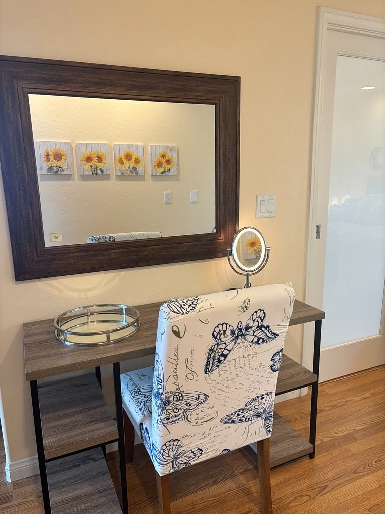 Vanity table w/ wall mirror, lighted face mirror, and chair