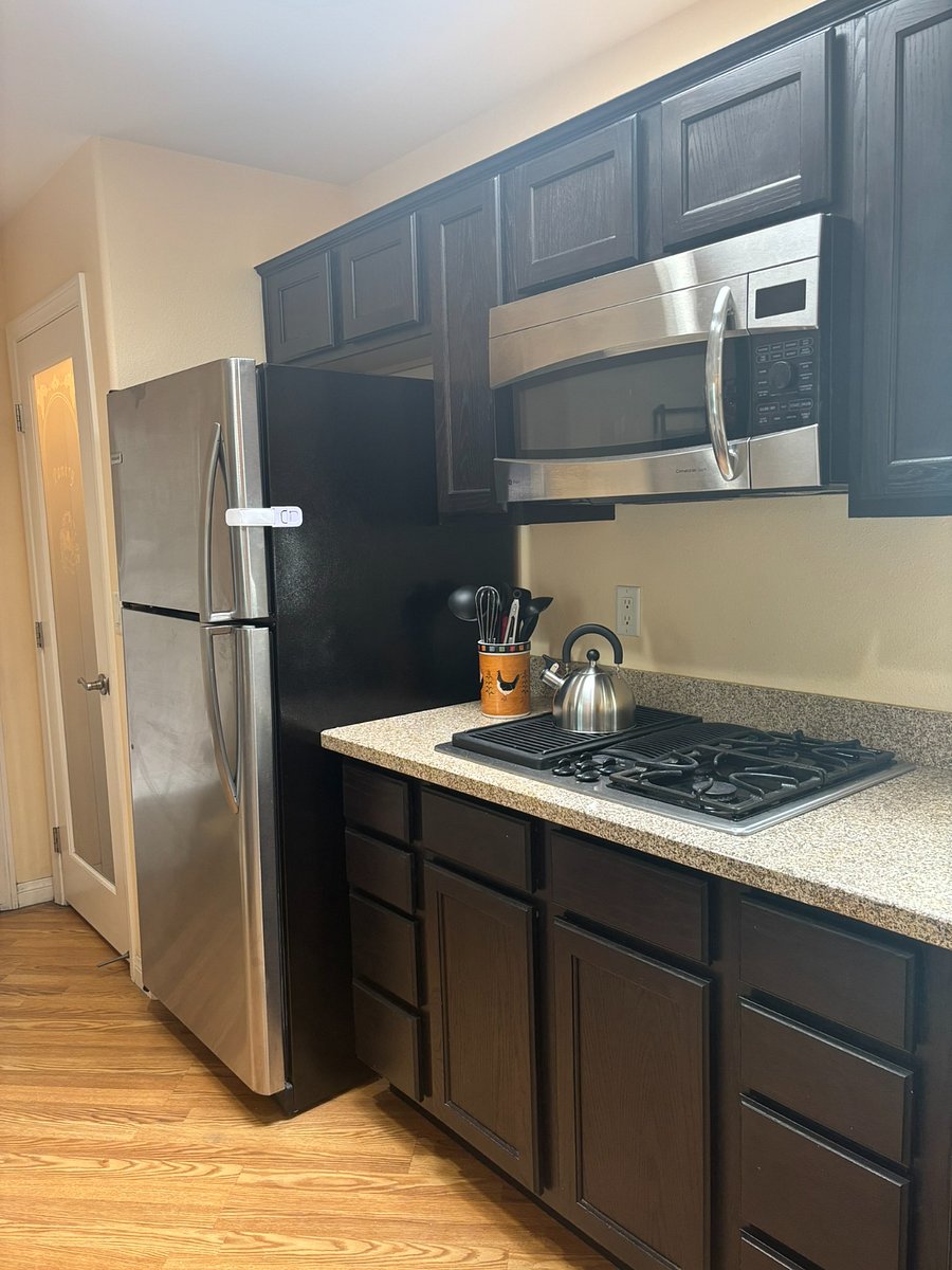 Kitchen - pantry, refrigerator, stove-top, microwave / convection oven, cabinet storage