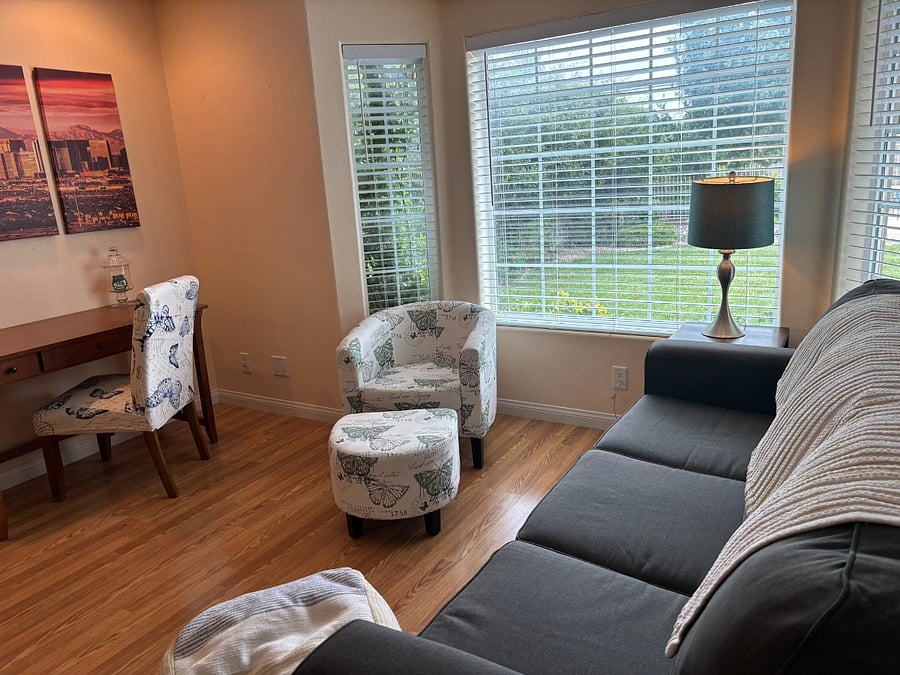 Living Rooom - Sofa, Armchair, Desk, Bay Window w/ Garden & Pool View