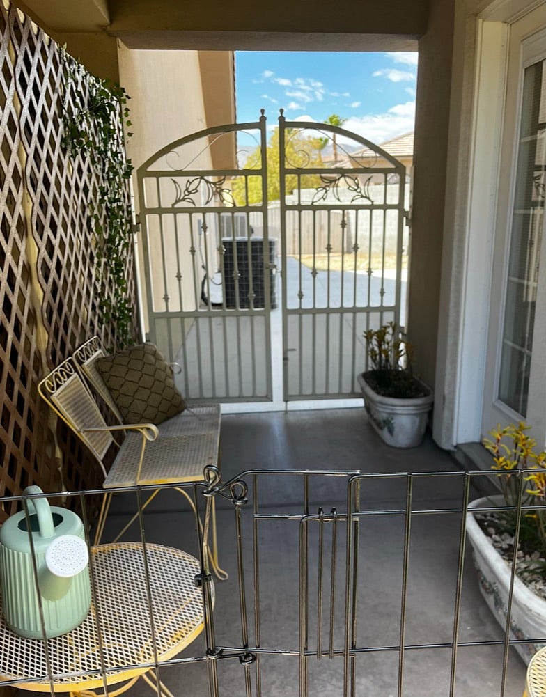 Entryway leading from garage side door to front porch of Casita.