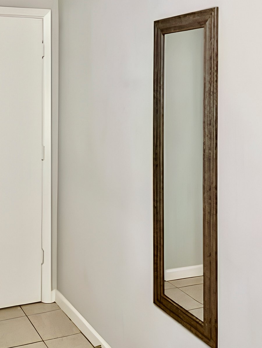 Wall mirror included