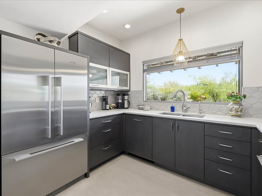 Custom Cabinets with Quartz countertops and Fisher-Pykel appliances