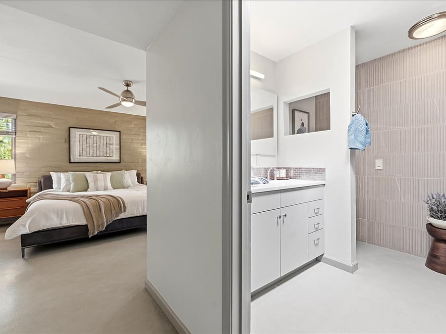 Primary bath has newly designed oversized shower with a rain head