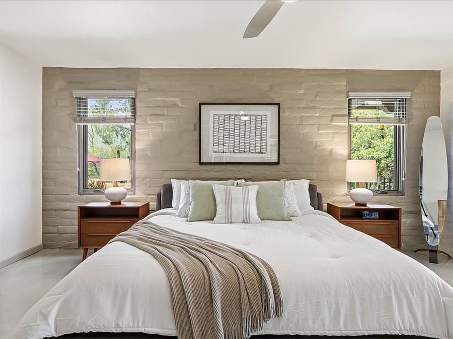 Charming and large peaceful master bedroom that looks onto the back patio area