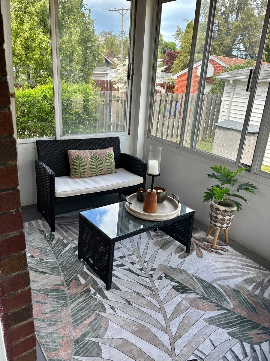 Screened in porch also has windows to open and close.