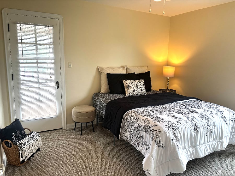 2nd Bedroom with Queen size bed and door to porch