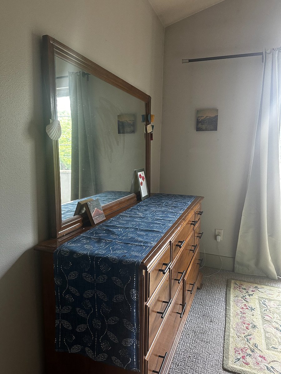 Picture of dresser from room entrance. Ample space for clothes!