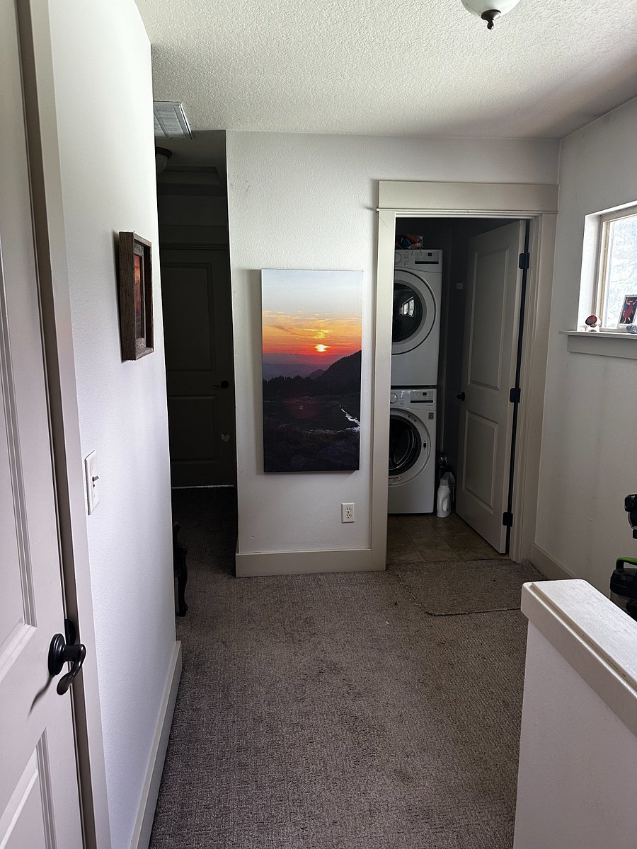Shared washer/dryer unit right outside of the guest suite