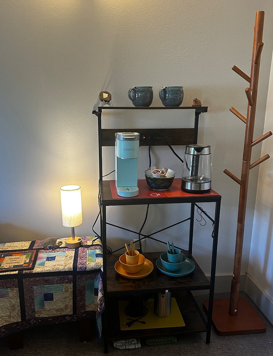 Dedicated coffee/tea/beverage area and
coat rack