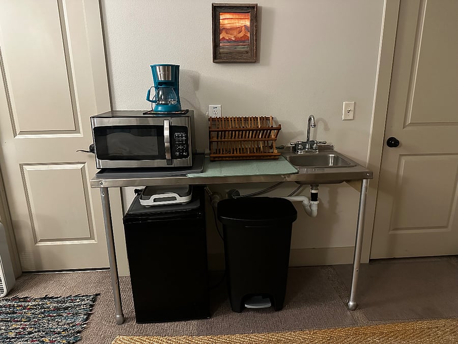 Microwave/mini-fridge/coffee maker/trash can
Utility sink and wash basin make clean up simple!