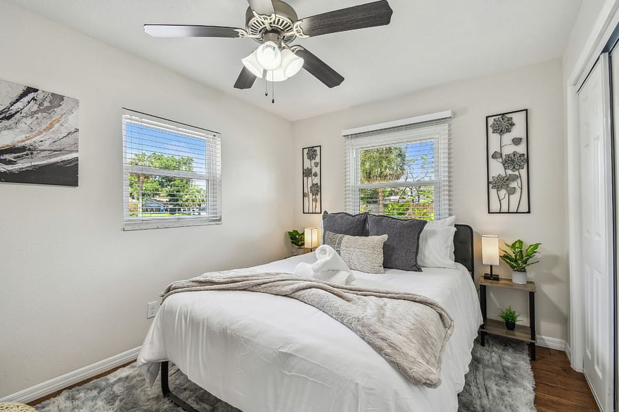 Bedroom 2, queen bed, with closet and workspace