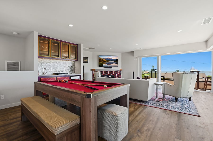 Upstairs family room with wet bar, pool table, ping-pong table and Smart TV