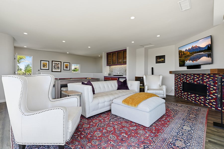 Upstairs family room with wet bar, pool table, ping-pong table and Smart TV