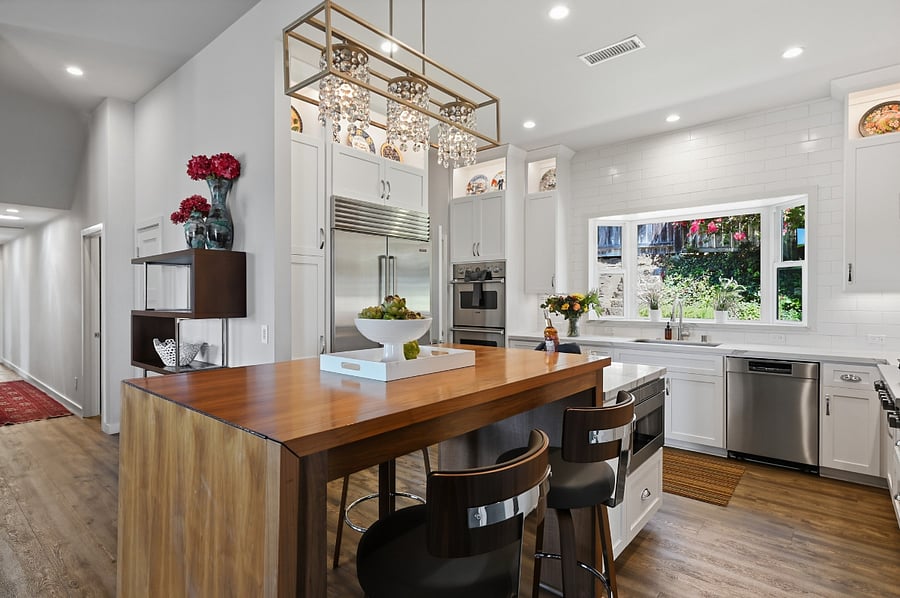 Kitchen with island and walk-in pantry