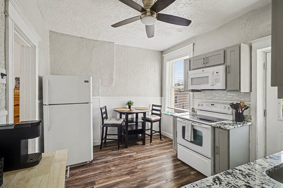 2nd floor kitchen with all necessities and access to back balcony 