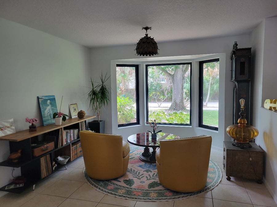 Sitting area with huge bay windows