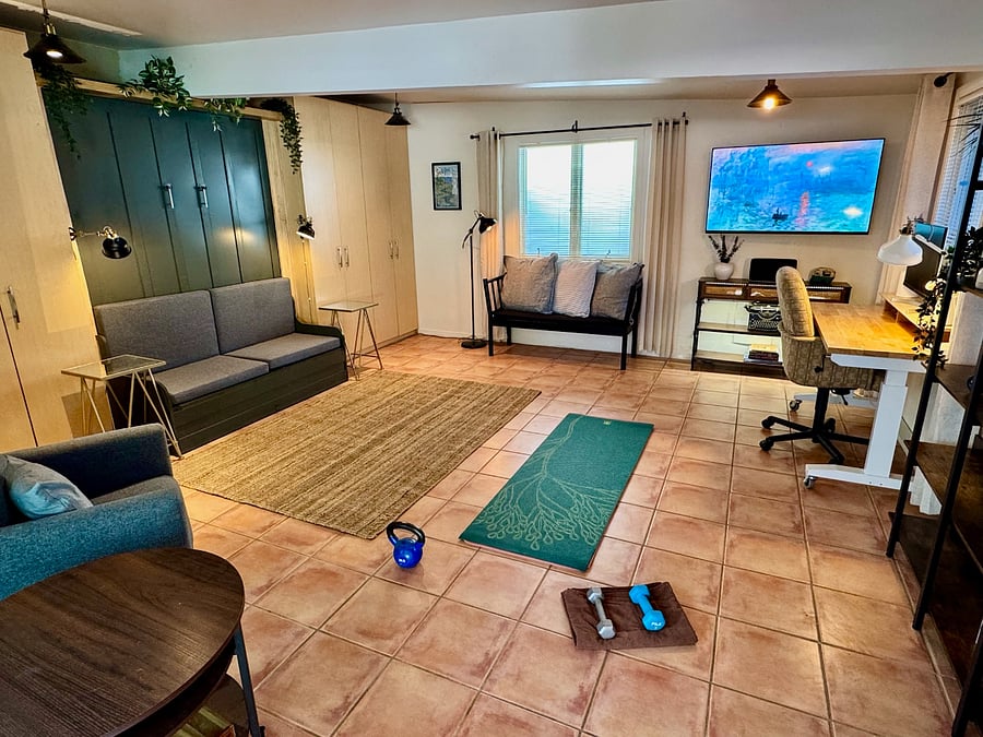 Lots of space for exercise in the work-from-home office/detached studio when the queen Murphy bed is folded away.