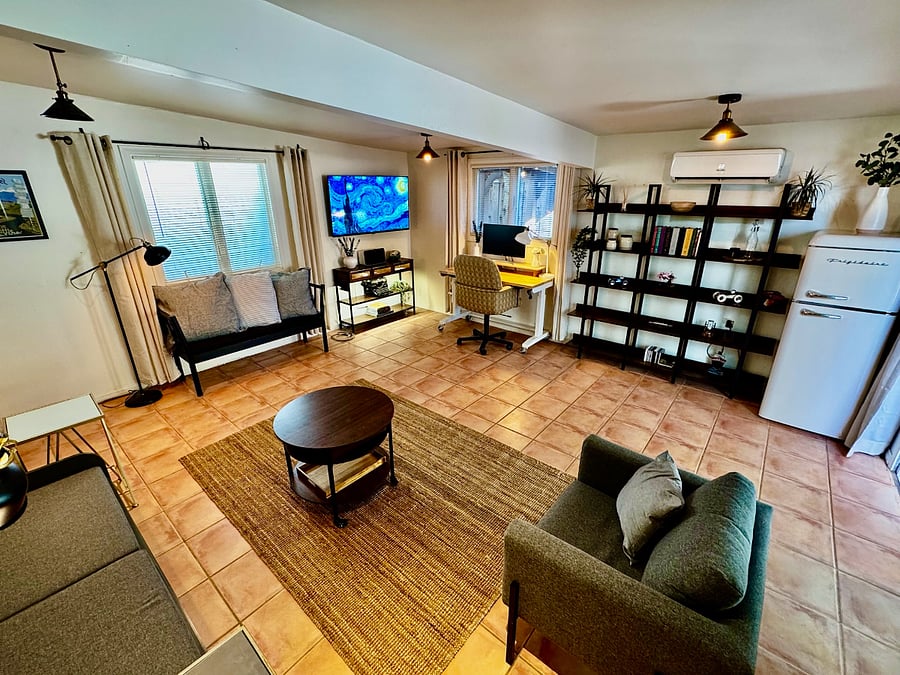 WFH office/detached studio space includes adjustable standing desk and apartment fridge