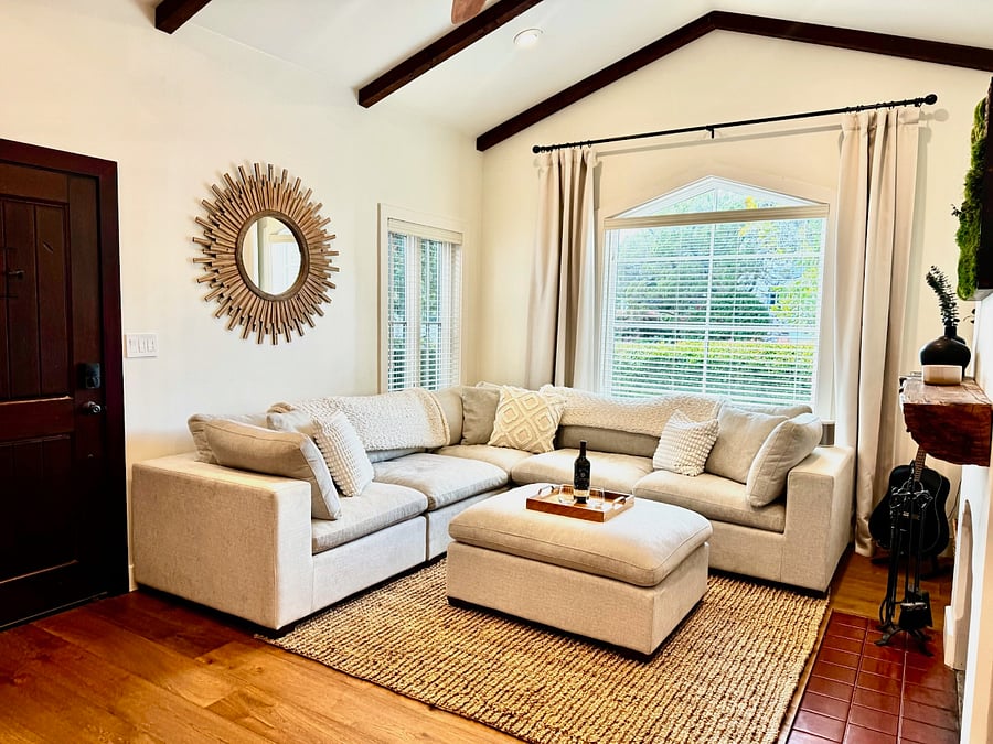 Living Room with fireplace, lots of sunshine and large smart TV
