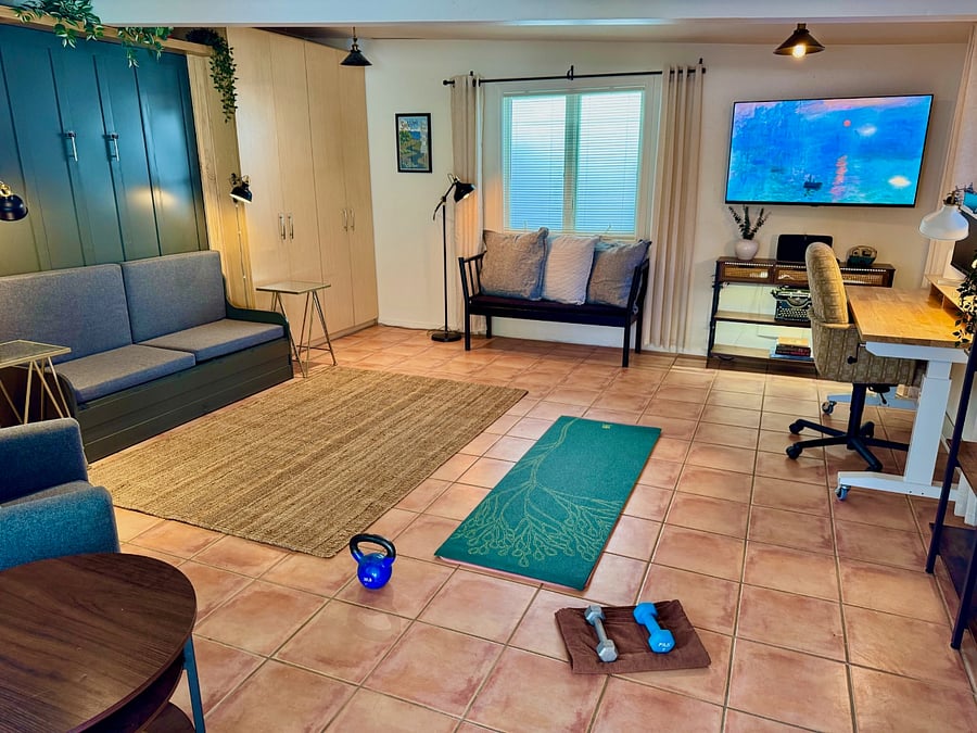 Detached studio can be used as a work from home space, exercise studio or pull the Queen Murphy bed down for an extra guest bedroom!