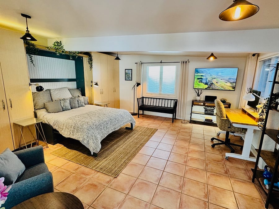 Detached studio can be used as a work from home space, exercise studio or pull the Queen Murphy bed down for an extra guest bedroom!