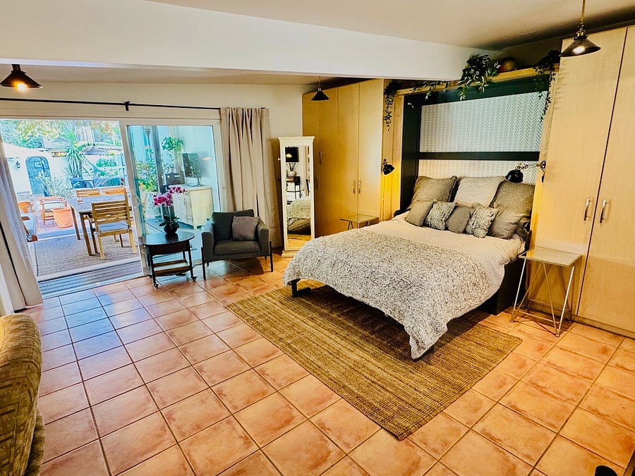 Detached studio can be used as a work from home space, exercise studio or pull the Queen Murphy bed down for an extra guest bedroom!