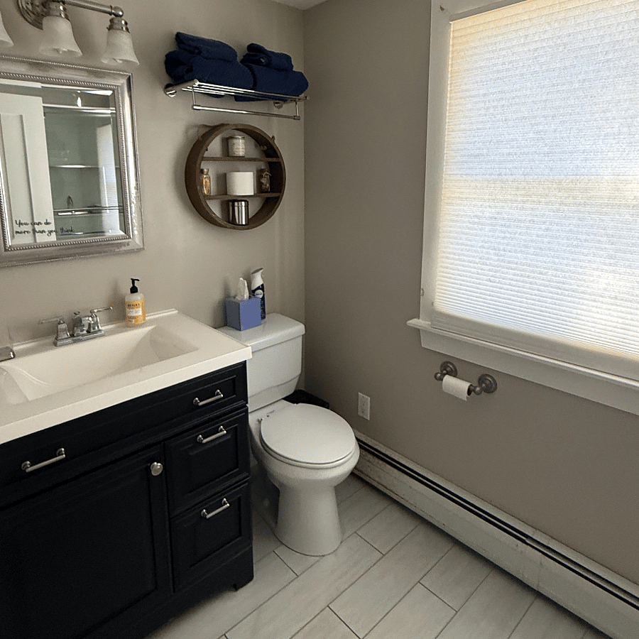 2nd floor full bath share by 3 tenants with deep soaking tub and spa shower fixtures. Cleaning service every 2 weeks included. 
