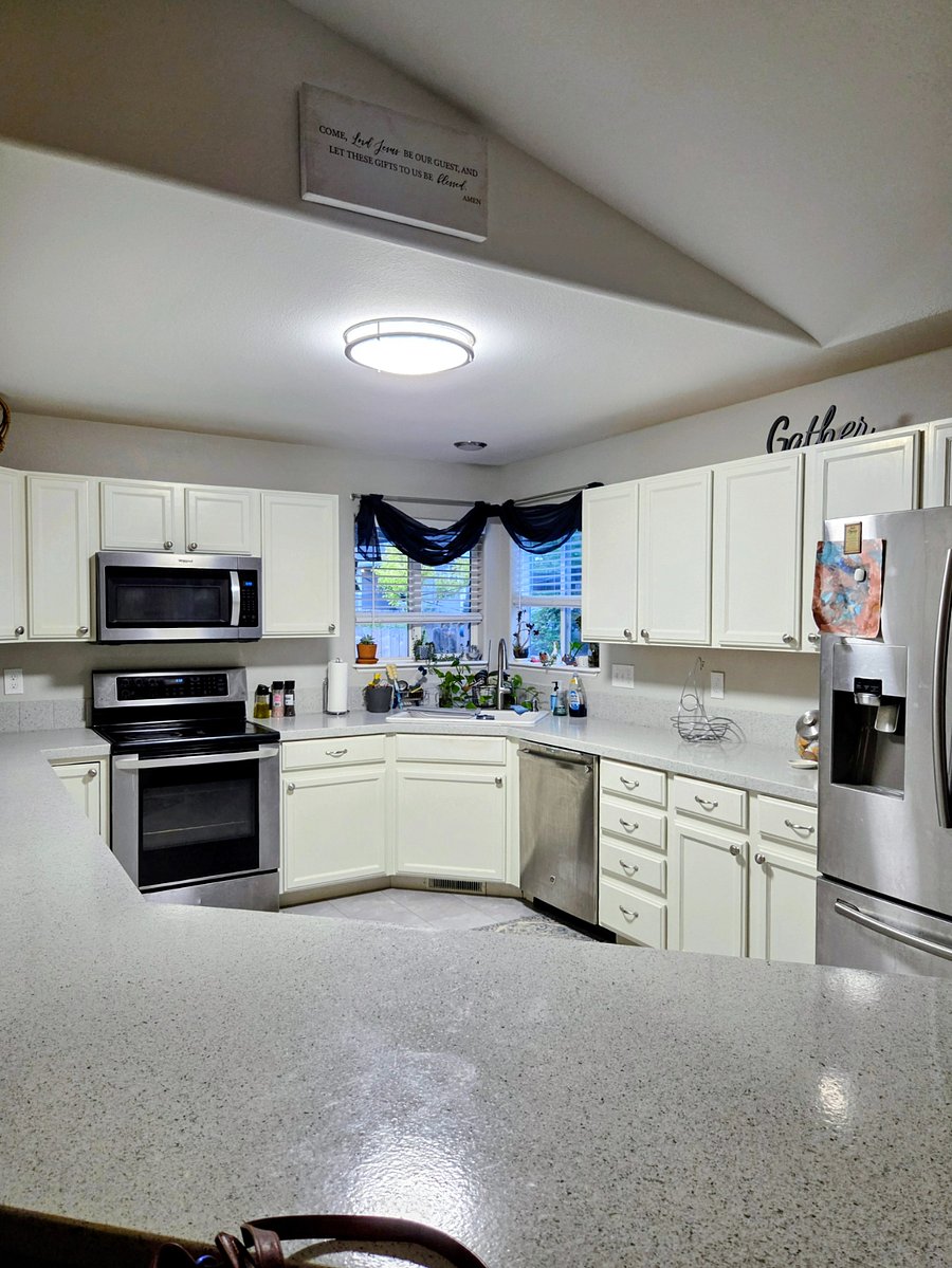 Open kitchen with all of the amenities including pots, pans, dishes, and utensils.