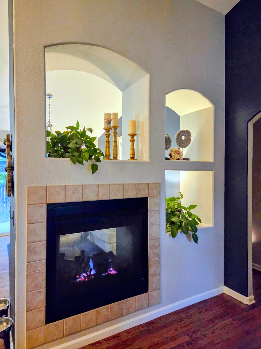Double-sided fireplace between sitting room and dining room