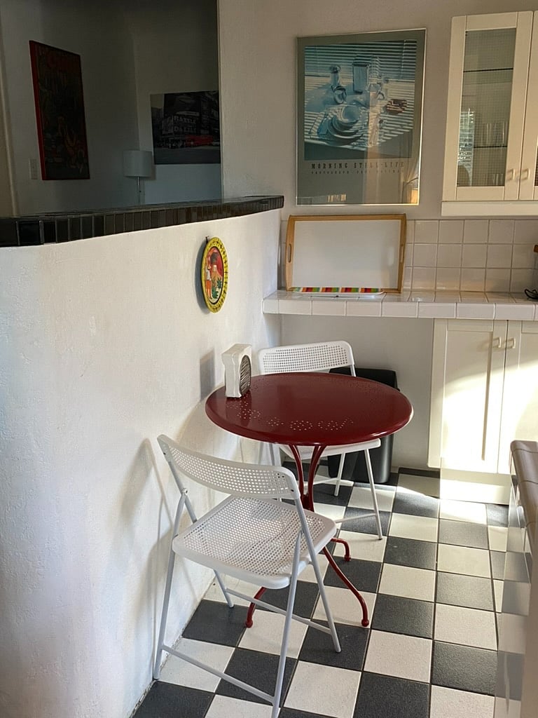 Small table and chairs for a quick coffee or snack.