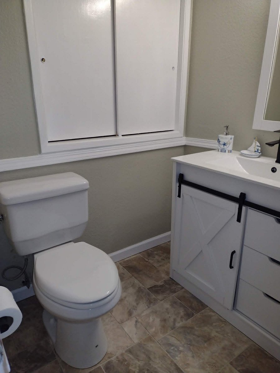 Bathroom with new Farmhouse style vanity - Linen Closet for bath towels and bedding