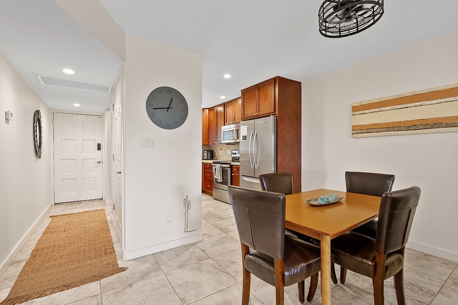 Open dining area with comfortable seating for four.